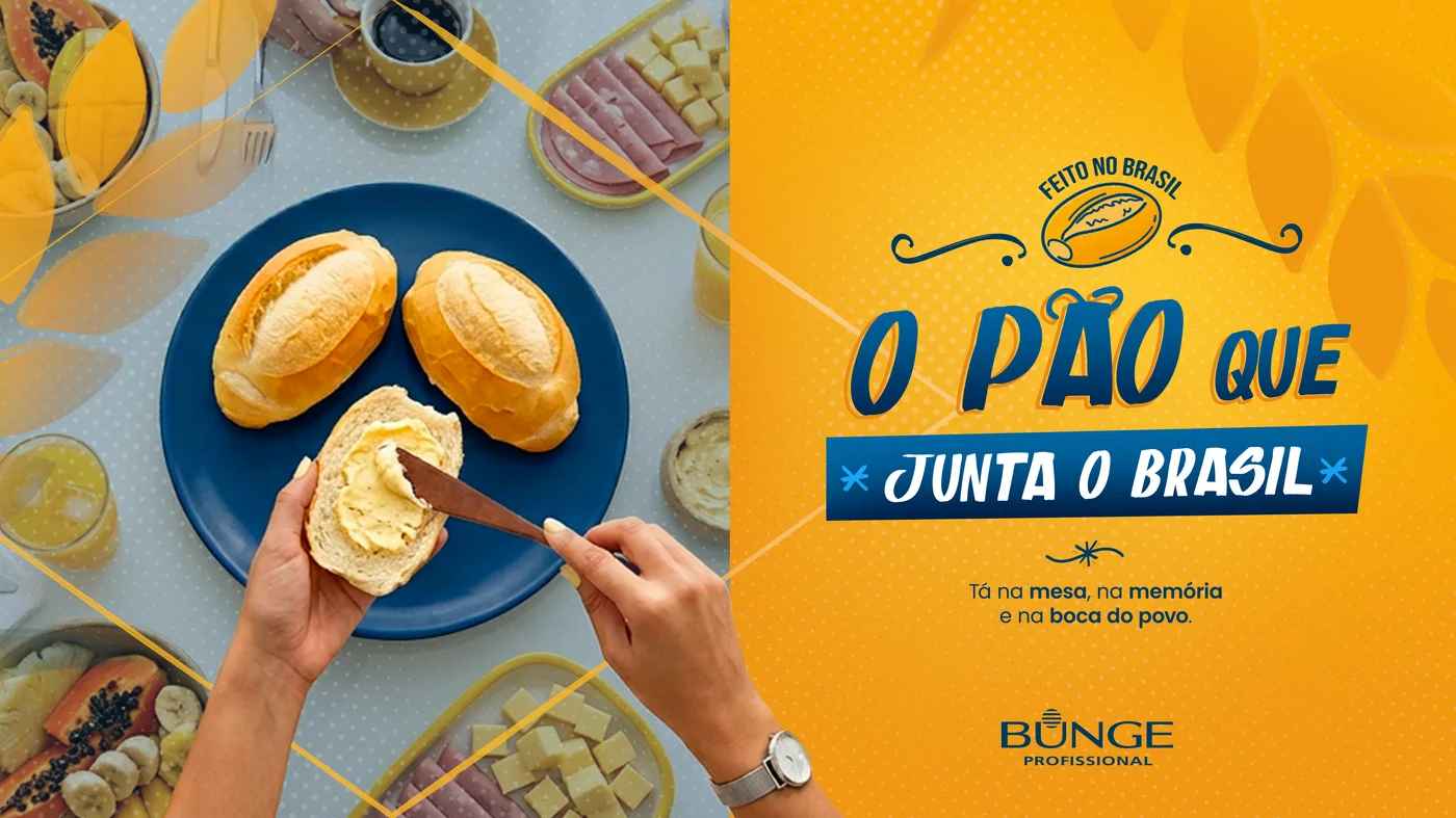 Key visual: mãos passando manteiga em um pão francês numa mesa de café da manhã, ao lado do logotipo da campanha
